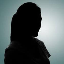 Silhouette of a person with a calm background, symbolizing mental health and healing.